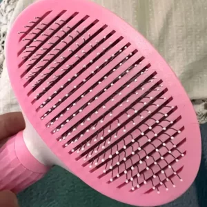 Ontvangen Zelfreinigende Hondenhaar Verwijderborstel van klant T***r.