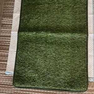 Ontvangen zindelijkheidstraining grasmat voor hond van klant E***a.