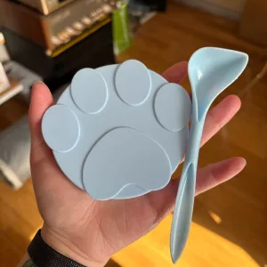 Ontvangen siliconen hondenvoer blikdeksel en lepel set van klant Z*****k.